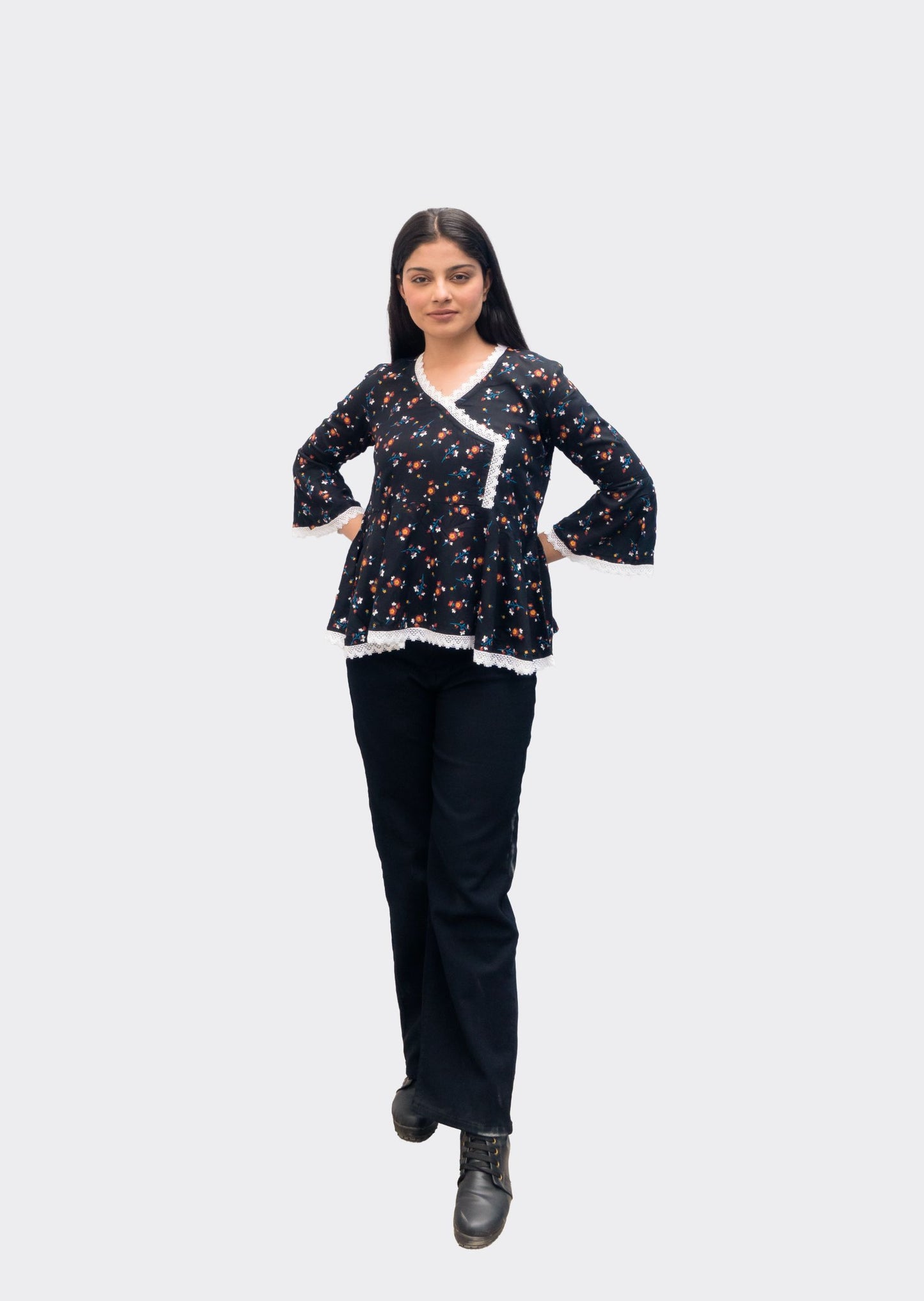 "Anikrriti's Elegant Black Peplum Top: A Stylish and Flattering Addition to Your Wardrobe"